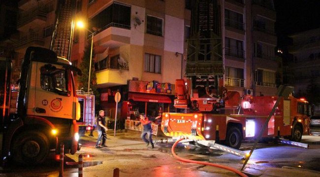 Amasya'da korkutan yangın! Balkondan hortumla müdahale etti